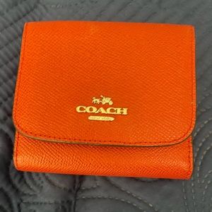 Like New Coach Trifold wallet. Loads of card storage in a compact wallet.
